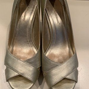 BCBG Generation Wedge heels. Gold color size 7.5